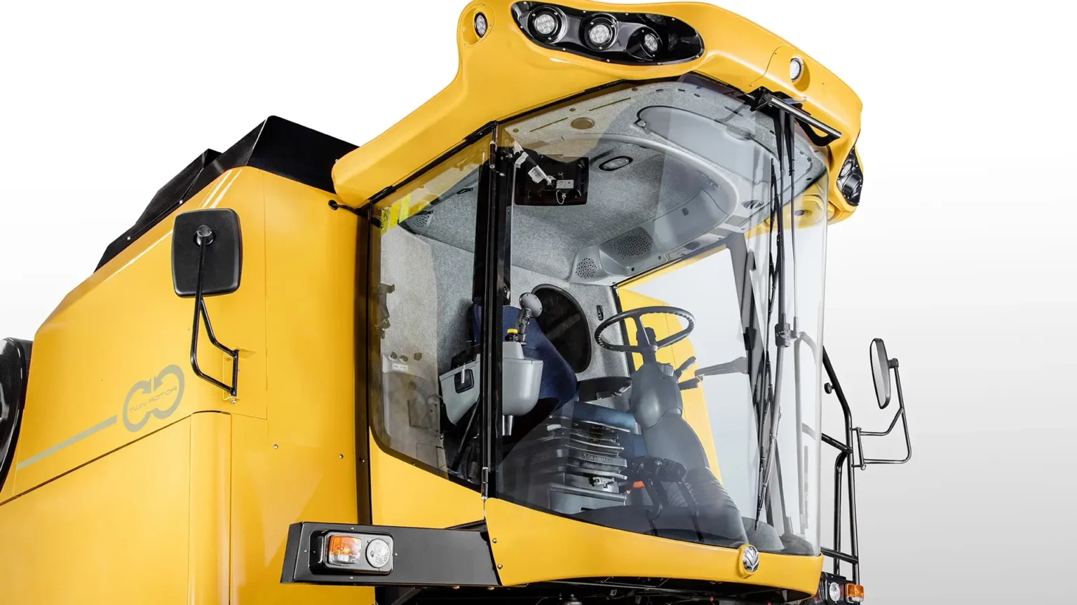 colheitadeiras-new-holland-modelo-tx-em-estudio-visao-de-fora-da-cabine[1]